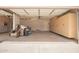 Spacious two-car garage with overhead storage, built-in storage cabinets, and ample space for vehicles and projects at 2018 E Avenida Del Sol --, Phoenix, AZ 85024