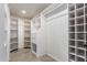 Spacious walk-in closet featuring ample storage with shelving, drawers, and rods at 2018 E Avenida Del Sol --, Phoenix, AZ 85024