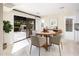 Cozy dining area with backyard views, natural light, and stylish decor for comfortable meals at 22633 N Clubhouse Way, Scottsdale, AZ 85255