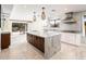 Modern kitchen with granite countertops, stainless steel appliances, and a large center island for entertaining at 22633 N Clubhouse Way, Scottsdale, AZ 85255