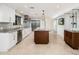 Open kitchen featuring stainless steel appliances, a granite island, and plenty of storage space at 22633 N Clubhouse Way, Scottsdale, AZ 85255