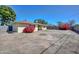 Spacious backyard with covered patio and garden, perfect for outdoor living at 2419 W Shady Glen Ave, Phoenix, AZ 85023