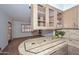 Bright kitchen area showcases updated stainless steel appliances, open plan, and natural light at 2419 W Shady Glen Ave, Phoenix, AZ 85023