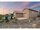 Charming single-Gathering home features a private pool, desert landscaping, and an attached garage at 24280 N 164Th Dr, Surprise, AZ 85387