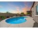 Private pool with desert landscaping and an outdoor lounge area, perfect for relaxing at 24280 N 164Th Dr, Surprise, AZ 85387