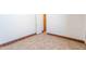 Bedroom featuring neutral paint, baseboard trim, and tile flooring at 2445 W Yuma St, Phoenix, AZ 85009