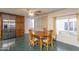 Eat-in kitchen featuring stainless refrigerator, natural wood cabinets, and a window at 2445 W Yuma St, Phoenix, AZ 85009