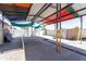 Spacious covered parking area, perfect for multiple vehicles, with ample storage space at 2445 W Yuma St, Phoenix, AZ 85009