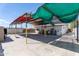 Large covered parking area with storage space, providing protection from the elements at 2445 W Yuma St, Phoenix, AZ 85009