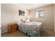 Comfortable bedroom with plush pillows, side table, and lots of natural light at 2524 S El Paradiso -- # 122, Mesa, AZ 85202