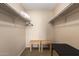 Spacious walk-in closet with built-in shelving; ideal for efficient storage at 2524 S El Paradiso -- # 122, Mesa, AZ 85202