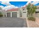 Charming townhome with two-car garage, terra cotta tile roof, and gated entry, near community lake at 2524 S El Paradiso -- # 122, Mesa, AZ 85202