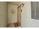 Inviting front entrance with welcome mat and decorative sunburst design at 2524 S El Paradiso -- # 122, Mesa, AZ 85202