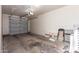 Spacious garage with concrete floor and overhead lighting at 2524 S El Paradiso -- # 122, Mesa, AZ 85202