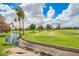 Scenic golf course view with waterway and mature landscaping at 2524 S El Paradiso -- # 122, Mesa, AZ 85202