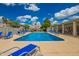 Sparkling community pool with plenty of seating and lounging areas at 2524 S El Paradiso -- # 122, Mesa, AZ 85202
