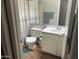 Cozy bathroom with tiled floors, a toilet, and vanity at 2649 N 85Th Ave, Phoenix, AZ 85037