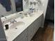 Bathroom featuring double sinks, vanity, and plenty of counter space at 2649 N 85Th Ave, Phoenix, AZ 85037