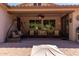 Inviting covered back patio with ceiling fan, outdoor seating, and views of the backyard at 2680 E Lodgepole Dr, Gilbert, AZ 85298