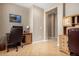 Home office featuring neutral colors, tile floors, and ample space for dual workstations at 2680 E Lodgepole Dr, Gilbert, AZ 85298