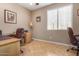 Functional home office with tile flooring, dual desks, and natural light at 2680 E Lodgepole Dr, Gilbert, AZ 85298