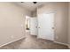 A bright bedroom with neutral walls, closet, and a ceiling fan at 3485 S Seneca Way, Gilbert, AZ 85297