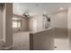 Spacious loft area featuring neutral walls, ceiling fan, and an abundance of natural light at 3485 S Seneca Way, Gilbert, AZ 85297