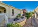Private backyard with pavers, a built-in bench, a fire pit and manicured landscaping at 3566 S Colorado St, Chandler, AZ 85286