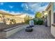 Outdoor space featuring pavers, a fire pit, and a privacy wall for relaxed outdoor living at 3566 S Colorado St, Chandler, AZ 85286