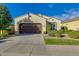 Charming single-story home featuring a well-manicured lawn, two-car garage, and inviting curb appeal at 3566 S Colorado St, Chandler, AZ 85286