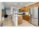 Bright kitchen featuring stainless steel appliances, wood cabinets, and a center island at 3566 S Colorado St, Chandler, AZ 85286