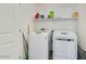 Clean and functional laundry room with modern white washer and dryer at 3566 S Colorado St, Chandler, AZ 85286