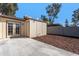 Private backyard with concrete patio and wood chip landscaping at 3646 N 69Th Ave # 55, Phoenix, AZ 85033