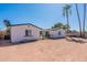 A spacious backyard showing the exterior, with potential for outdoor enjoyment and landscaping opportunities at 3802 W Mission Ln, Phoenix, AZ 85051