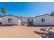 A spacious backyard showing the exterior of the property, offering a large, blank canvas at 3802 W Mission Ln, Phoenix, AZ 85051