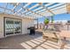 Backyard patio with barbecue and pergola covering at 3802 W Mission Ln, Phoenix, AZ 85051