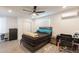 Modern bedroom with ceiling fan, closet and desk at 3802 W Mission Ln, Phoenix, AZ 85051
