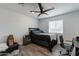 Bedroom with ceiling fan and gray flooring at 3802 W Mission Ln, Phoenix, AZ 85051