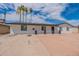 Charming single-story home with a fresh exterior and desert landscaping at 3802 W Mission Ln, Phoenix, AZ 85051