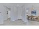 Bright foyer with an interior white front door and dining room with natural light at 3843 E Hazeltine Way, Chandler, AZ 85249