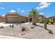 Charming home featuring desert landscaping with a healthy palm tree and stone accents at 3843 E Hazeltine Way, Chandler, AZ 85249