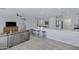 This bright, open-concept kitchen provides seamless flow to the living room and dining area at 3843 E Hazeltine Way, Chandler, AZ 85249