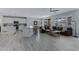 Open-concept living room boasts seamless flow to the kitchen and ample natural light at 3843 E Hazeltine Way, Chandler, AZ 85249