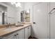 Bathroom features a double sink vanity and an oversized mirror at 4020 N 151St Dr, Goodyear, AZ 85395
