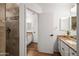 Beautifully updated bathroom with granite counters and a luxurious tiled shower at 4020 N 151St Dr, Goodyear, AZ 85395