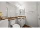 Charming bathroom with granite counters, updated fixtures and an oversized mirror at 4020 N 151St Dr, Goodyear, AZ 85395