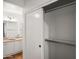 Open closet with shelving and a view to the bathroom, providing convenient storage at 4020 N 151St Dr, Goodyear, AZ 85395