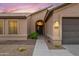 Inviting single-story home showcasing a well-maintained front yard with desert landscaping at 4020 N 151St Dr, Goodyear, AZ 85395