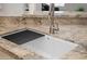 Close-up of kitchen sink, faucet, and granite countertops at 4020 N 151St Dr, Goodyear, AZ 85395