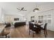 Open living space with hardwood floors, comfortable seating and a dining area, perfect for entertaining at 4020 N 151St Dr, Goodyear, AZ 85395